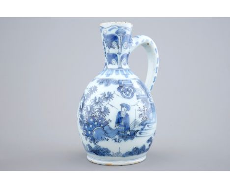 A Dutch Delft blue and white chinoiserie jug, late 17th C. H.: 20 cm  Provenance: With a label for M. Bascourt, Antwerp, on t