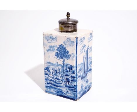 A rare blue and white Amsterdam Delft gin bottle or tea caddy, ca. 1720 Dim.:  L.: 12 cm - B.: 10 cm - H.: 25,5 cm  Condition