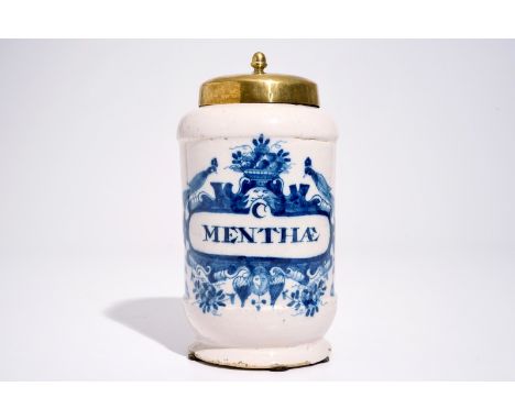 A Dutch Delft blue and white albarello-shaped pharmacy drug jar, 18th C. H.: 20,5 cm - Dia.: 11 cm  Marked on the base with a