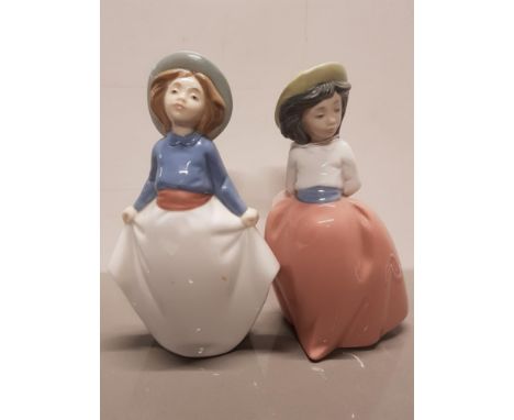 2 NAO FIGURES 1290 GIRL HOLDING DRESS AND 1291 PLACID WALK