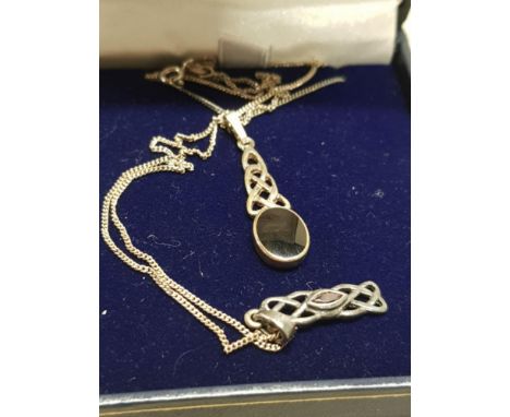 2 CELTIC STERLING PENDANTS ON CHAINS