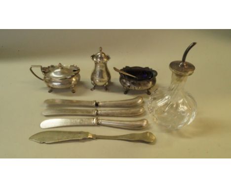  A silver three piece condiment set, by W Hutton & Sons Ltd, Sheffield 1930; together with a silver mounted glass dressing ta