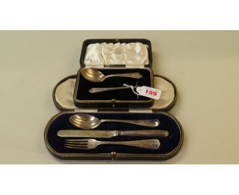 A cased silver knife, fork and spoon, by Mappin & Webb; together with a cased child's silver spoon and pusher, 100g weighable