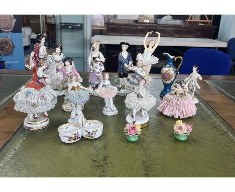 Collection of porcelain figures, including German with cross swords marks, 19th century pair of rural figures marked undergla