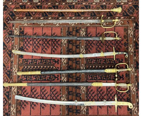 Updated lot info (if 8 swords, top-down. Title &amp; Description) - A Collection of Eight Swords with scabbards and an inlaid