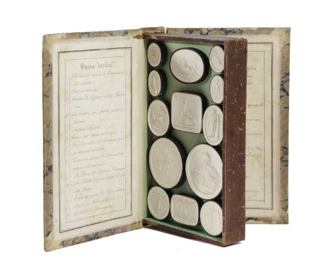 'LIBEROTTI IMPRONTE'. AN ITALIAN GRAND TOUR FAUX BOOK OF PLASTER INTAGLIOSRETAILED BY GIOVANNI LIBEROTTI, ROME, FIRST HALF 19