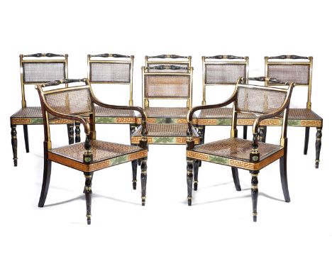 A SET OF EIGHT REGENCY SIMULATED ROSEWOOD DINING CHAIRSEARLY 19TH CENTURYeach parcel gilt and polychrome decorated with leave