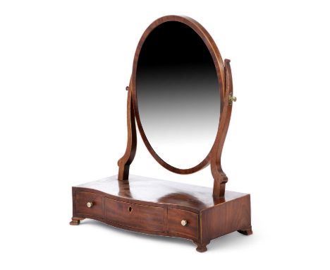 λA GEORGE III MAHOGANY DRESSING TABLE MIRRORC.1790-1800the replaced circular plate on a serpentine base with boxwood edging a