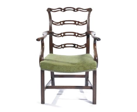 A GEORGE III MAHOGANY ARMCHAIRC.1770with a pierced ladder back, above a dipped seat covered in green silk damask