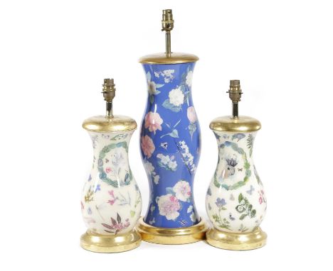 A PAIR OF DECALCOMANIA TABLE LAMPS20TH CENTURYof baluster form, decorated with flowers, fungi and birds on a cream ground tog