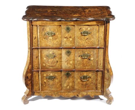  A DUTCH WALNUT AND MARQUETRY COMMODE LATE 18TH / EARLY 19TH CENTURYinlaid with flowers, urns and birds, with three ripple mo