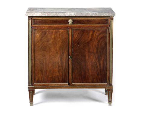 A NORTH EUROPEAN MAHOGANY AND BRASS MOUNTED SIDE CABINET FIRST HALF 19TH CENTURYthe marble top above a shallow frieze drawer 