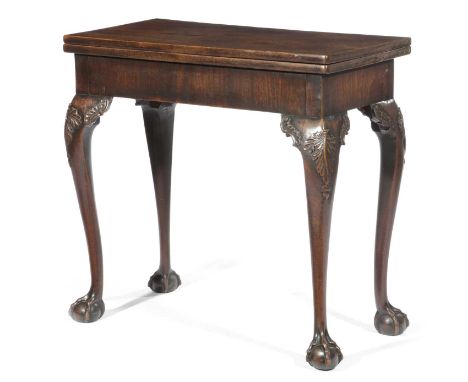 A GEORGE II MAHOGANY CARD TABLEC.1750-60the fold-over top on a single gate support, revealing a baize lined playing surface, 