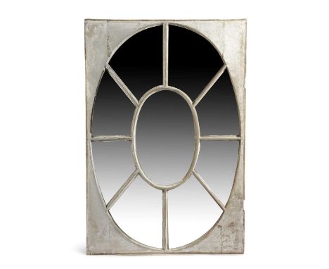 AN ARCHITECTURAL OVAL WINDOW OR OEIL-DE-BOEUFC.1800with a central oval pane inside eight fan shaped panes, in a white painted
