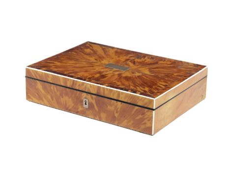 λA REGENCY BLONDE TORTOISESHELL WORK BOXEARLY 19TH CENTURYof rectangular form, the quarter veneered cover with ivory edging a