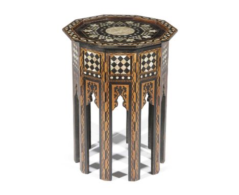 A MOORISH EBONISED AND MOTHER OF PEARL OCCASIONAL TABLEPROBABLY TURKISH, LATE 19TH CENTURYthe octagonal top inlaid with parqu