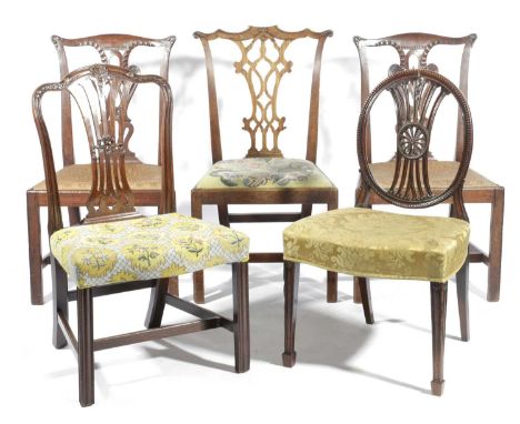 FIVE GEORGE III MAHOGANY SIDE CHAIRS18TH CENTURYincluding: a pair of chairs each with a pierced splat in the Chippendale styl