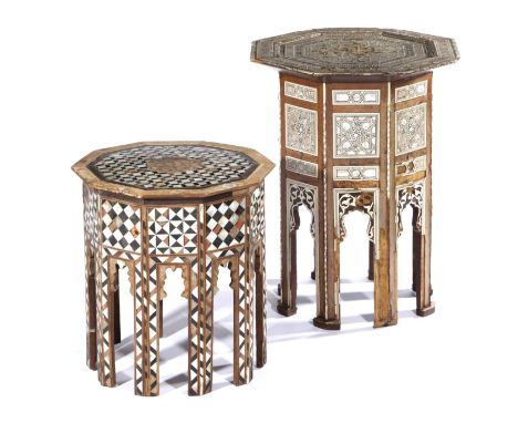 TWO MOORISH OCTAGONAL OCCASIONAL TABLESLATE 19TH CENTURYeach inlaid with mother of pearl with geometric motifs (2)59.5cm high