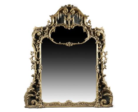 A VICTORIAN GILTWOOD OVERMANTEL MIRRORIN GEORGE III CHIPPENDALE STYLE, 19TH CENTURYthe shaped plates within a Rococo decorate