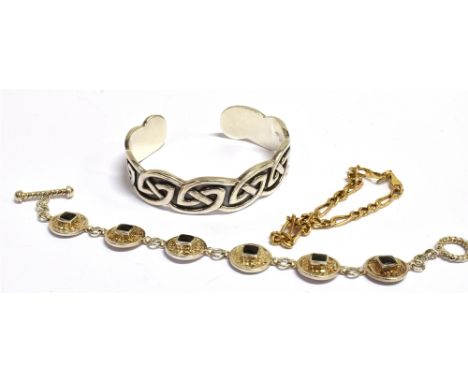 THREE BRACELETS  Comprising a stamped 9KT MADE IN ITALY Figaro chain bracelet, length 17cm, weight 2.3g, a marked 925 celtic 