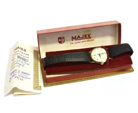 A BOXED GENTS GOLD CASED MAJEX WRISTWATCH  with original guarantee, the watch with champagne dial, signed Majex 17 jewels Swi