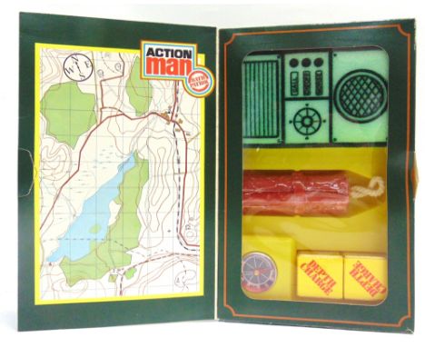 AN ACTION MAN BATH PATROL MAP CASE  comprising two 'depth charge' bath cubes, one 'dynamite' soap', one compass, and one walk