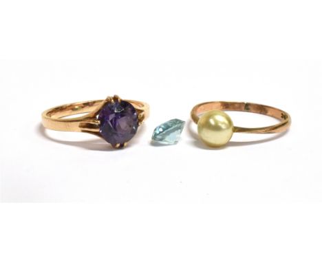 TWO SINGLE STONE SET YELLOW GOLD DRESS RINGS  comprising a button shaped cultured pearl and a synthetic colour change sapphir