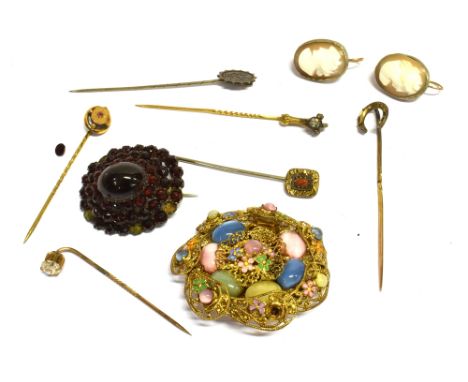 A COLLECTION OF EARLY 20TH CENTURY JEWELLERY Comprising of six stick pins (one stamped 9ct gold and one set with an old cut d