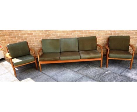 GRETE JALK FOR FRANCE &amp; SONS, DENMARK:  a teak framed sofa and matching pair of armchairs, the soda 180cm long Condition 