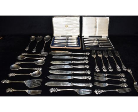 A COLLECTION OF SILVER AND EPNS FLATWARE  comprising of two cased sets of six silver handled butter knives and a quantity of 