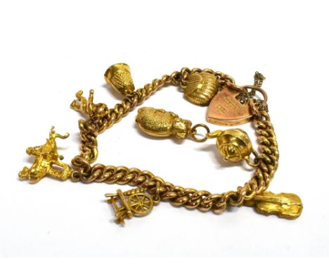 A 9CT GOLD CHARM BRACELET  Together with a separate unattached 9ct gold Koala Bear charm, the bracelet comprising of a curb l