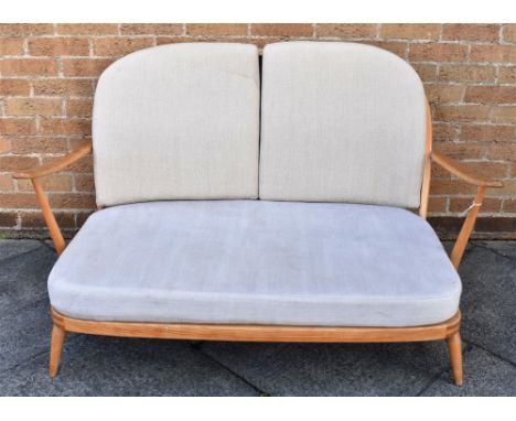 AN ERCOL TWO SEATER WINDSOR SOFA