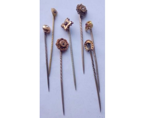 Seven assorted stick pins, six marked 15ct with one other