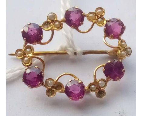 9ct marked pearl and almandine garnet set oval brooch