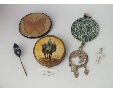 Silver and metal brooches, pendants etc., and metal compact