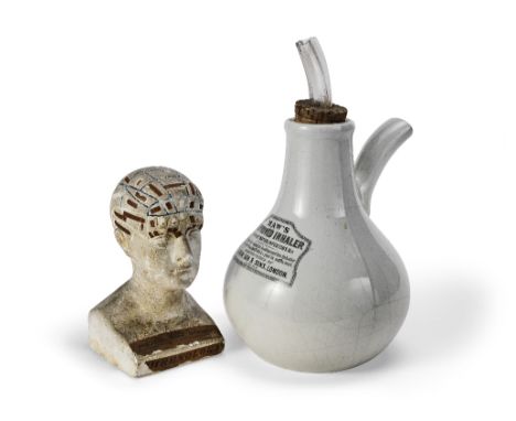 A plaster phrenology bust19th centuryWith paper label to the front of the base, together with a ceramic inhaler by Maw, Son &