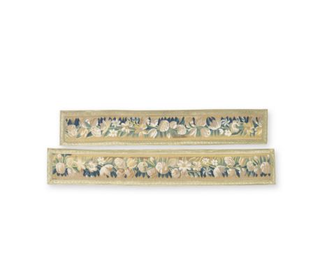 A pair of tapestry runnersOf 17th century design, but later reweaving of a tapestry border, designed with white peonies, tuli