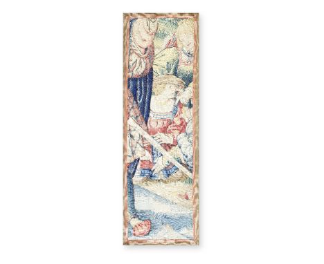 A Flemish tapestry fragmentSecond quarter of the 16th century, possibly TournaiDesigned with a kneeling male in red and blue 