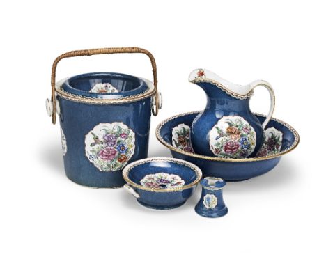 An English porcelain part-toilet service20th century, stamped Copeland and SpodeWith blue ground and painted with flower spra