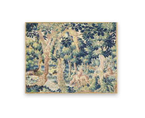 A tapestry fragmentCirca 1580-1600, OudenaardeDesigned with stags within a wooded landscape, a crane wading in the river and 