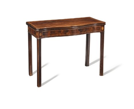 A George III mahogany and satinwood banded serpentine card tableThe satinwood banded fold-over top enclosing a baize lined pl