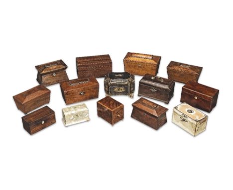 A collection of tea caddies18th century and laterIncluding a George II mahogany tea caddy with a brass carrying handle and hi