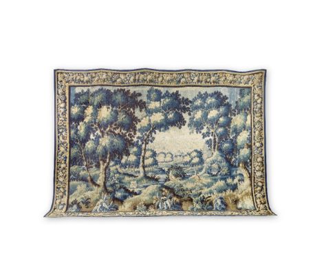 An Aubusson verdure tapestryLate 17th centuryWith pheasants in a wooded river landscape, a small dog and other perching birds