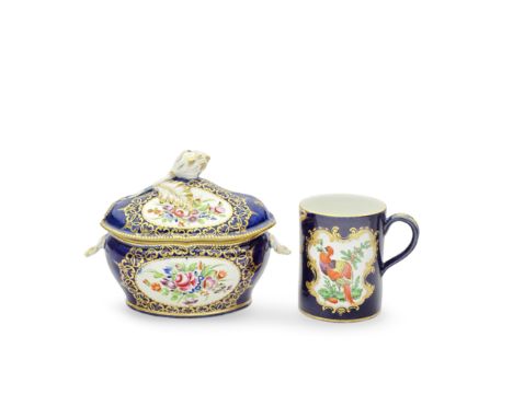 A Worcester sauce tureen and cover and a small mug, circa 1770-80The sauce tureen of lobed oval shape, painted with panels of