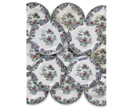 A Copeland part-dinner serviceIn the famille rose style decorated with flowers within grey scroll-pattern borders, comprising