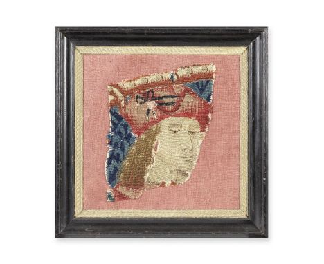 A Flemish tapestry fragmentLate 15th century, possibly TournaiDesigned with a male figure with downcast expression, flowing l