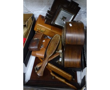 A mantel clock, a barometer, and brushes etc