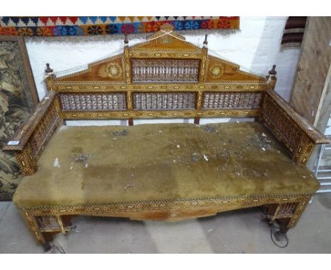 A Moorish design bone inlaid and spindle decorated settee, L135cm