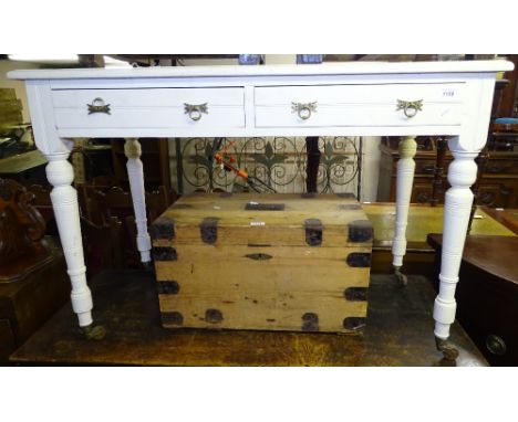 A painted pine 2-drawer writing table, on ring turned legs, W109cm