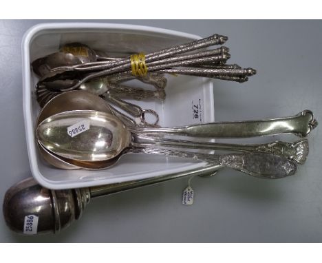 A silver plated holy water sprinkler, a long handled ladle, stuffing spoons, and various cutlery